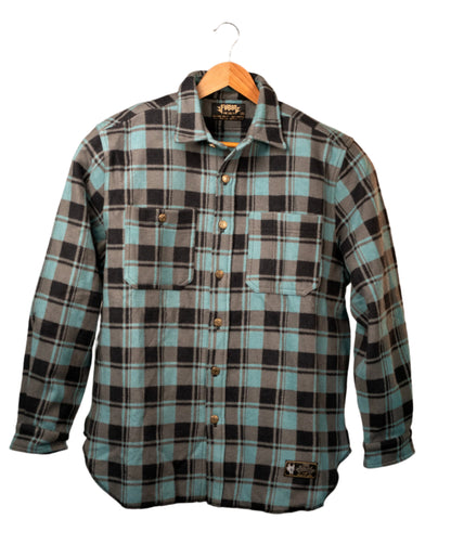 Plaid shirt on a hanger against a plain background