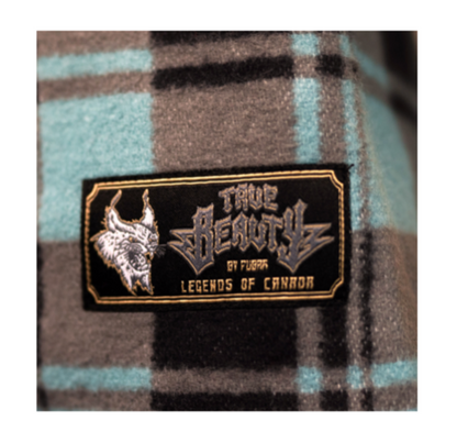 Plaid fabric with a 'True Beauty' label featuring a logo.